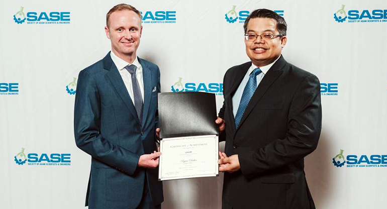 Ryan Dedios accepts SASE Professional Achievement Award