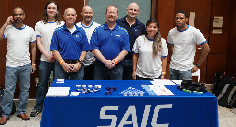 SAIC software and cyber team members at the RamHacks hackathon